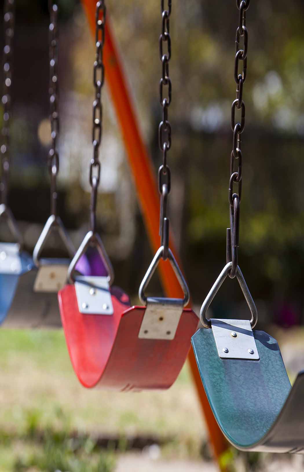empty-colorful-swings-at-the-park