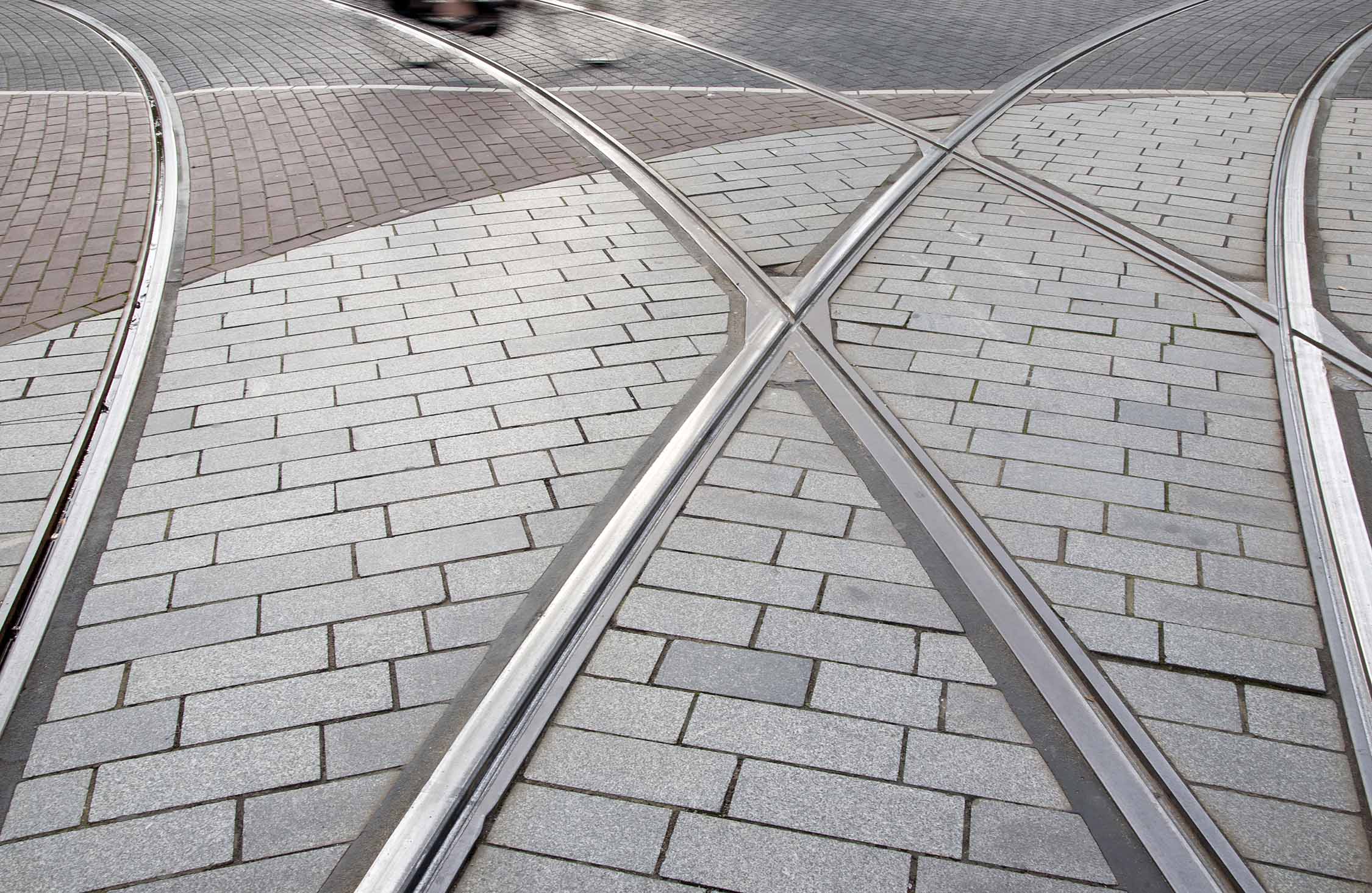tram-track-and-cyclist-in-rotterdam